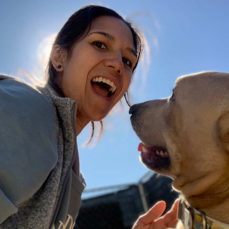 Ray Gorniak smiling with yellow lab